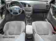 2006 Hyundai Elantra GLS z VIN KMHDN46D16U202797, wystawiony jako Copart lot #77802954 z przebiegiem 156 712 mil mil oraz Szkoda całkowita • Salvage title. Historia ofert i sprzedaży dostępna na DreamBid. Obrazek 8.