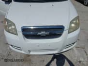 ✅ 2009 Chevrolet Aveo 1LT • VIN: KL1TD56E89B610707 • Lot: 42058828. Wystawiony na IAAI z przebiegiem 42 776 mil. Bezpłatny archiwum sprzedaży aukcyjnych z USA i szczegółowy raport historii pojazdu na DreamBid. Zdjęcie 6.