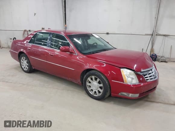 ✅ 2010 Cadillac DTS 1SA • VIN: 1G6KA5EY7AU124491 • Lot: 43310882. Listed on IAAI with 208,705 mi. Free auction sales archive from the USA and detailed vehicle history report at DreamBid. Image 1.