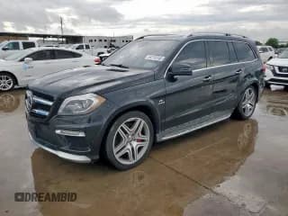 ✅ 2015 Mercedes-Benz GL 63 AMG • VIN: 4JGDF7EE6FA561699 • Lot: 54718745. Listed on Copart with 127,928 mi. Free auction sales archive from the USA and detailed vehicle history report at DreamBid. Image 1.