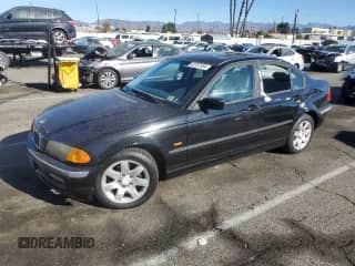 1999 BMW 3 Series 323i with VIN WBAAM3331XKC56081, listed as a Copart auction lot 82767554 with 92,916 mi miles and Salvage title. Bid and sale history available at DreamBid. Image 1.