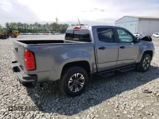✅ 2022 Chevrolet Colorado 4WD Z71 • VIN: 1GCGTDEN7N1169564 • Лот: 56117633. Опубликован ранее на Copart с пробегом 22 104 миль. Бесплатный доступ к архиву аукционных продаж из США и подробный отчёт об истории автомобиля на DreamBid. Изображение 3.