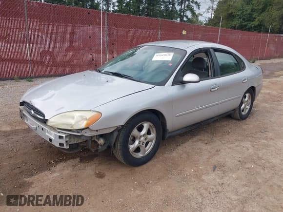 ✅ 2003 Ford Taurus SE Standard • VIN: 1FAFP53U43A119272 • Lot: 43269838. Listed on IAAI with 168,335 mi. Free auction sales archive from the USA and detailed vehicle history report at DreamBid. Image 2.
