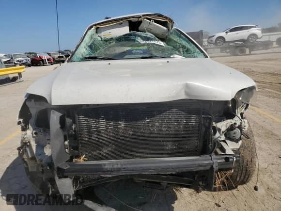 2009 Mercury Mariner Premier с VIN 4M2CU87799KJ04016, выставлен на аукционе Copart как лот 84371425 с пробегом Не указан миль и Списание • Salvage title. История ставок и продаж доступна на DreamBid. Изображение 5.