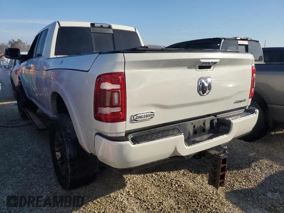 ✅ 2020 Ram 2500 Laramie Longhorn • VIN: 3C6UR5GL3LG142841 • Lot: 77254264. Listed on Copart with Not provided. Free auction sales archive from the USA and detailed vehicle history report at DreamBid. Image 2.