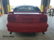 ✅ 1998 Ford Mustang • VIN: 1FAFP404XWF153965 • Lot: 81031665. Listed on Copart with 97,434 mi. Free auction sales archive from the USA and detailed vehicle history report at DreamBid. Image 6.