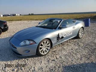 ✅ 2007 Jaguar XK • VIN: SAJWA44BX75B09612 • Лот: 75139114. Опубликован ранее на Copart с пробегом 86 094 миль. Бесплатный доступ к архиву аукционных продаж из США и подробный отчёт об истории автомобиля на DreamBid. Изображение 1.