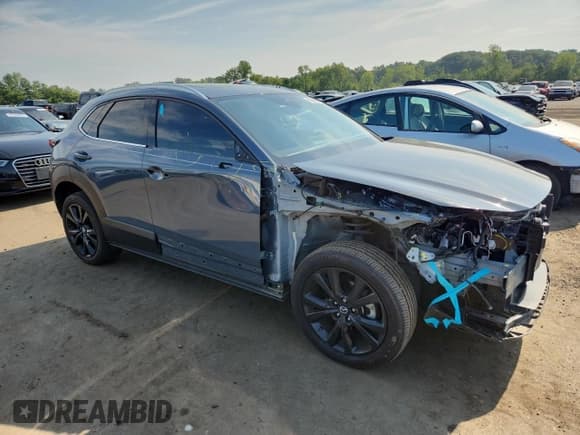 ✅ 2021 Mazda CX-30 Premium • VIN: 3MVDMBDY9MM308867 • Lot: 65981015. Listed on Copart with 38,222 mi. Free auction sales archive from the USA and detailed vehicle history report at DreamBid. Image 4.