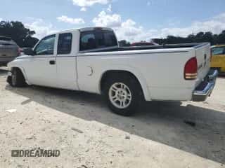 2003 Dodge Dakota SLT z VIN 1D7HL42XX3S333865, wystawiony jako Copart lot #73509404 z przebiegiem 123 515 mil mil oraz Szkoda całkowita • Salvage title. Historia ofert i sprzedaży dostępna na DreamBid. Obrazek 2.