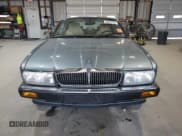 ✅ 1994 Jaguar XJ • VIN: SAJHX1740RC692884 • Lot: 66224115. Listed on Copart with 150,617 mi. Free auction sales archive from the USA and detailed vehicle history report at DreamBid. Image 5.