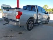 ✅ 2017 Nissan Titan Platinum Reserve • VIN: 1N6AA1E68HN542396 • Lot: 43688877. Listed on IAAI with 124,644 mi. Free auction sales archive from the USA and detailed vehicle history report at DreamBid. Image 4.
