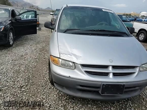 ✅ 2000 Dodge Caravan SE • VIN: 1B4GP44G2YB583404 • Lot: 69976215. Listed on Copart with Not provided. Free auction sales archive from the USA and detailed vehicle history report at DreamBid. Image 14.