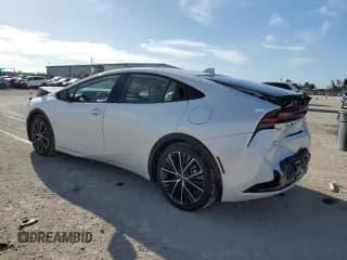 ✅ 2023 Toyota Prius LE • VIN: JTDACAAU6P3008082 • Lot: 69841073. Listed on Copart with 1,189 mi. Free auction sales archive from the USA and detailed vehicle history report at DreamBid. Image 2.