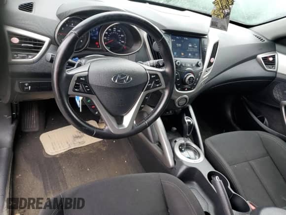 2017 Hyundai Veloster z VIN KMHTC6AD3HU314945, wystawiony jako Copart lot #50851883 z przebiegiem 114 523 mil mil oraz . Historia ofert i sprzedaży dostępna na DreamBid. Obrazek 8.