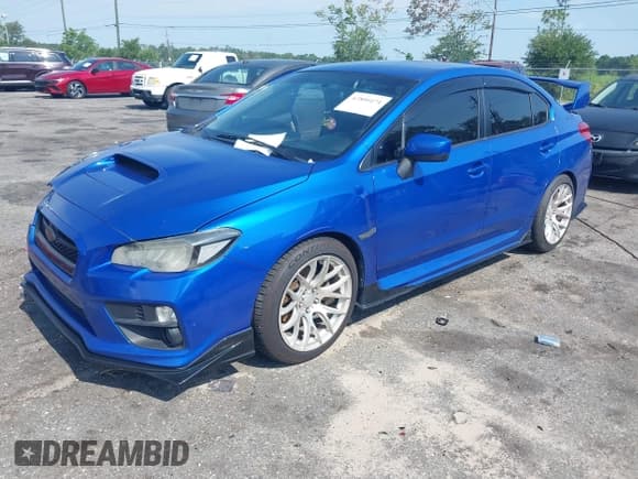 ✅ 2016 Subaru WRX • VIN: JF1VA1B62G9820120 • Lot: 42800474. Listed on IAAI with 88,261 mi. Free auction sales archive from the USA and detailed vehicle history report at DreamBid. Image 2.