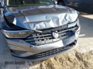 ✅ 2021 Volkswagen Jetta SEL • VIN: 3VWE57BU9MM093326 • Lot: 43365614. Wystawiony na IAAI z przebiegiem 48 794 mil. Bezpłatny archiwum sprzedaży aukcyjnych z USA i szczegółowy raport historii pojazdu na DreamBid. Zdjęcie 6.