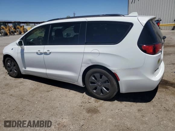 ✅ 2020 Chrysler Pacifica Hybrid Touring L • VIN: 2C4RC1L73LR270556 • Lot: 66037415. Listed on Copart with 58,142 mi. Free auction sales archive from the USA and detailed vehicle history report at DreamBid. Image 2.