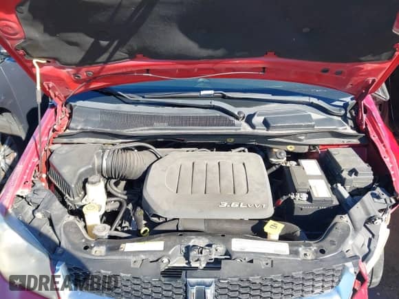 2012 Dodge Grand Caravan SXT z VIN 2C4RDGCG2CR203463, wystawiony jako IAAI lot #43425555 z przebiegiem 142 039 mil mil oraz . Historia ofert i sprzedaży dostępna na DreamBid. Obrazek 10.