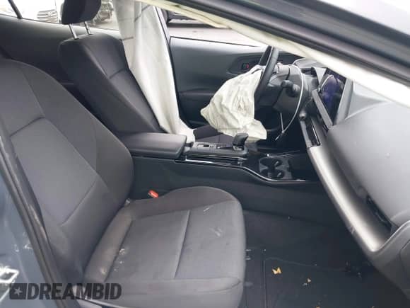 2024 Toyota Prius LE with VIN JTDACAAU6R3046057, listed as a IAAI auction lot 43316816 with 14,220 mi miles and . Bid and sale history available at DreamBid. Image 5.