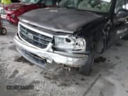 ✅ 2003 Ford F-150 XL • VIN: 1FTRX17273NB81668 • Lot: 42628802. Listed on IAAI with Not provided. Free auction sales archive from the USA and detailed vehicle history report at DreamBid. Image 6.