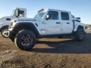 ✅ 2024 Jeep Gladiator Mojave X • VIN: 1C6JJTEGXRL105351 • Lot: 84422724. Listed on Copart with 13,998 mi. Free auction sales archive from the USA and detailed vehicle history report at DreamBid. Image 1.