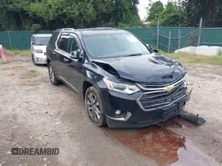 2020 Chevrolet Traverse Premier with VIN 1GNEVKKWXLJ100651, listed as a IAAI auction lot 43047891 with 82,498 mi miles and . Bid and sale history available at DreamBid. Image 1.