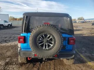 ✅ 2024 Jeep Wrangler Rubicon • VIN: 1C4RJXFGXRW280585 • Лот: 89502825. Опубликован ранее на Copart с пробегом 7 098 миль. Бесплатный доступ к архиву аукционных продаж из США и подробный отчёт об истории автомобиля на DreamBid. Изображение 6.