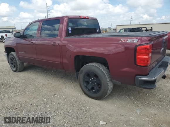 ✅ 2015 Chevrolet Silverado 1500 LT • VIN: 3GCUKREC1FG341057 • Лот: 64664804. Опубликован ранее на Copart с пробегом 118 148 миль. Бесплатный доступ к архиву аукционных продаж из США и подробный отчёт об истории автомобиля на DreamBid. Изображение 2.