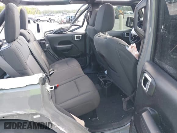 ✅ 2023 Jeep Wrangler Sport • VIN: 1C4HJXDG2PW677154 • Lot: 43756077. Listed on IAAI with 35,896 mi. Free auction sales archive from the USA and detailed vehicle history report at DreamBid. Image 8.