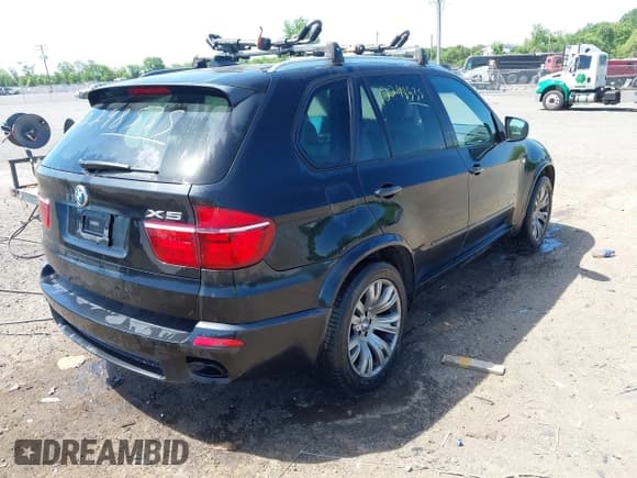 ✅ 2013 BMW X5 xDrive50i • VIN: 5UXZV8C54D0C15421 • Lot: 42298535. Listed on IAAI with 118,890 mi. Free auction sales archive from the USA and detailed vehicle history report at DreamBid. Image 4.