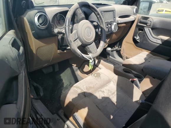 ✅ 2012 Jeep Wrangler Sahara • VIN: 1C4AJWBG1CL216425 • Lot: 48377825. Wystawiony na Copart z przebiegiem 99 649 mil. Bezpłatny archiwum sprzedaży aukcyjnych z USA i szczegółowy raport historii pojazdu na DreamBid. Zdjęcie 8.