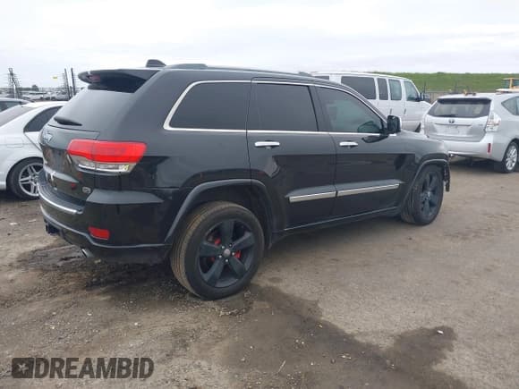 ✅ 2014 Jeep Grand Cherokee Overland • VIN: 1C4RJFCT2EC137783 • Lot: 41712645. Listed on IAAI with 166,964 mi. Free auction sales archive from the USA and detailed vehicle history report at DreamBid. Image 4.