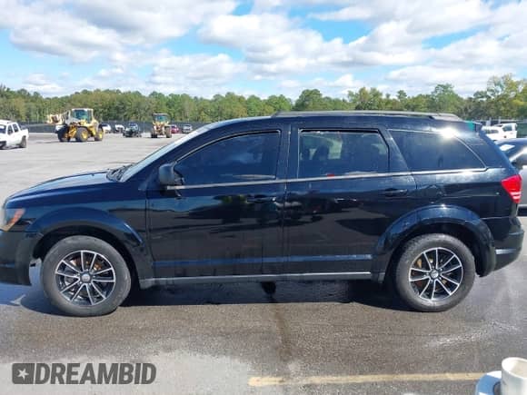 2017 Dodge Journey SE z VIN 3C4PDCAB4HT630221, wystawiony jako IAAI lot #43423577 z przebiegiem 126 030 mil mil oraz . Historia ofert i sprzedaży dostępna na DreamBid. Obrazek 14.