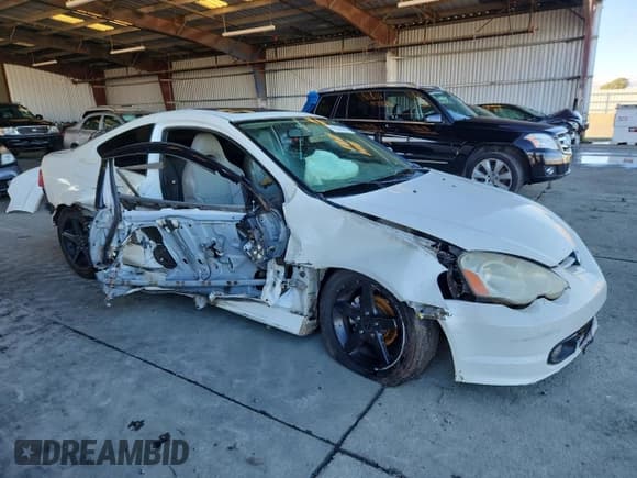 ✅ 2003 Acura RSX • VIN: JH4DC54833C007290 • Лот: 91874405. Опубликован ранее на Copart с пробегом Не указан. Бесплатный доступ к архиву аукционных продаж из США и подробный отчёт об истории автомобиля на DreamBid. Изображение 4.