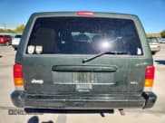 ✅ 1998 Jeep Cherokee Sport • VIN: 1J4FJ68S5WL152521 • Лот: 82504035. Опубликован ранее на Copart с пробегом 129 013 миль. Бесплатный доступ к архиву аукционных продаж из США и подробный отчёт об истории автомобиля на DreamBid. Изображение 6.