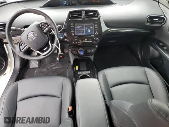 2021 Toyota Prius L Eco with VIN JTDKAMFU4M3139334, listed as a Copart auction lot 84025305 with 59,418 mi miles and Salvage title. Bid and sale history available at DreamBid. Image 8.