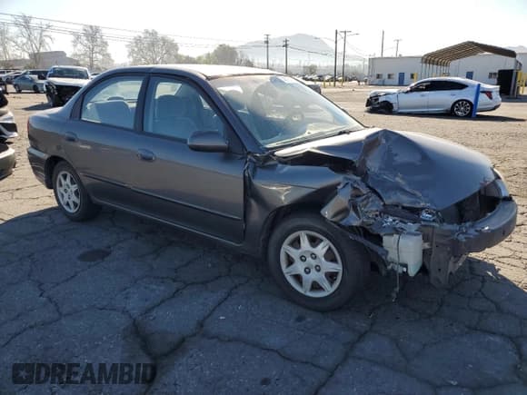 ✅ 2003 Kia Spectra • VIN: KNAFB121335277388 • Lot: 46756185. Wystawiony na Copart z przebiegiem 151 235 mil. Bezpłatny archiwum sprzedaży aukcyjnych z USA i szczegółowy raport historii pojazdu na DreamBid. Zdjęcie 4.