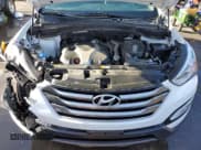 ✅ 2015 Hyundai Santa Fe Limited • VIN: 5XYZUDLA6FG278797 • Lot: 39714313. Listed on Copart with 116,265 mi. Free auction sales archive from the USA and detailed vehicle history report at DreamBid. Image 12.