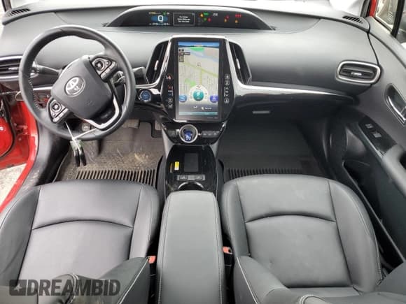 ✅ 2021 Toyota Prius LE • VIN: JTDKAMFP9M3189379 • Лот: 48824235. Опубликован ранее на Copart с пробегом 27 154 миль. Бесплатный доступ к архиву аукционных продаж из США и подробный отчёт об истории автомобиля на DreamBid. Изображение 8.