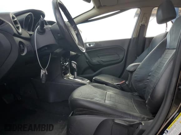 ✅ 2016 Ford Fiesta Titanium • VIN: 3FADP4FJ7GM138278 • Lot: 70993025. Wystawiony na Copart z przebiegiem 112 169 mil. Bezpłatny archiwum sprzedaży aukcyjnych z USA i szczegółowy raport historii pojazdu na DreamBid. Zdjęcie 7.