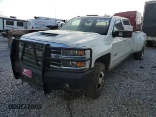 2018 Chevrolet Silverado 3500HD High Country с VIN 1GC4K1EY3JF197194, выставлен на аукционе Copart как лот 77817634 с пробегом 196 017 миль миль и Чистый • Clean title. История ставок и продаж доступна на DreamBid. Изображение 1.