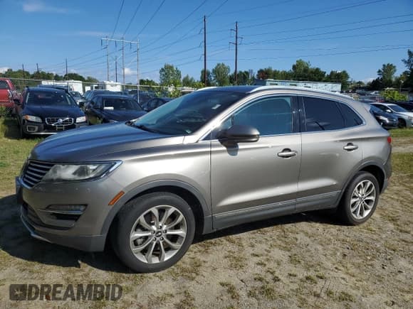 ✅ 2017 Lincoln MKC Select • VIN: 5LMCJ2D98HUL57289 • Лот: 80944775. Опубликован ранее на Copart с пробегом 87 570 миль. Бесплатный доступ к архиву аукционных продаж из США и подробный отчёт об истории автомобиля на DreamBid. Изображение 2.