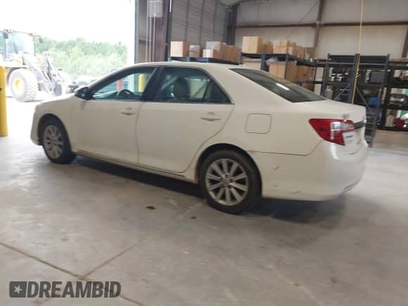 2013 Toyota Camry L with VIN 4T4BF1FK9DR293452, listed as a IAAI auction lot 42876325 with 225,034 mi miles and . Bid and sale history available at DreamBid. Image 3.