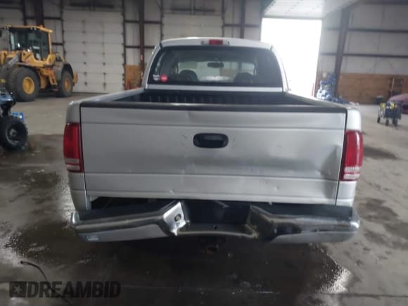 ✅ 2004 Dodge Dakota SLT • VIN: 1D7HG48N64S523528 • Lot: 41199575. Wystawiony na IAAI z przebiegiem 261 239 mil. Bezpłatny archiwum sprzedaży aukcyjnych z USA i szczegółowy raport historii pojazdu na DreamBid. Zdjęcie 16.