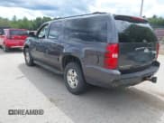 ✅ 2010 Chevrolet Suburban LT • VIN: 1GNUKJE33AR117502 • Lot: 43082827. Listed on IAAI with 200,098 mi. Free auction sales archive from the USA and detailed vehicle history report at DreamBid. Image 3.