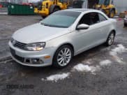 ✅ 2012 Volkswagen Eos Komfort • VIN: WVWBW7AH3CV003132 • Lot: 43839174. Listed on IAAI with 150,547 mi. Free auction sales archive from the USA and detailed vehicle history report at DreamBid. Image 2.