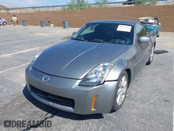 ✅ 2004 Nissan 350Z Touring • VIN: JN1AZ34E34M150283 • Lot: 42933213. Listed on IAAI with 90,012 mi. Free auction sales archive from the USA and detailed vehicle history report at DreamBid. Image 2.