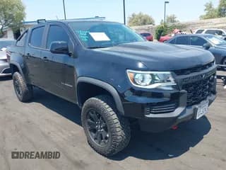✅ 2022 Chevrolet Colorado 4WD ZR2 • VIN: 1GCGTEEN2N1217607 • Лот: 42938996. Опубликован ранее на IAAI с пробегом 24 632 миль. Бесплатный доступ к архиву аукционных продаж из США и подробный отчёт об истории автомобиля на DreamBid. Изображение 1.