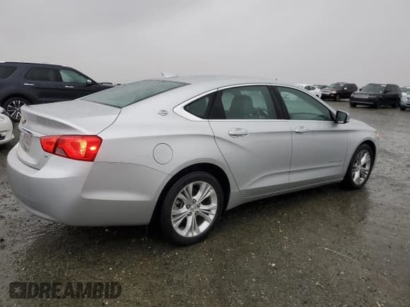 ✅ 2015 Chevrolet Impala LT • VIN: 1G1125S38FU107391 • Лот: 82209394. Опубликован ранее на Copart с пробегом 146 886 миль. Бесплатный доступ к архиву аукционных продаж из США и подробный отчёт об истории автомобиля на DreamBid. Изображение 3.