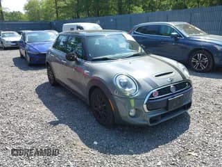 ✅ 2018 MINI Hardtop 4 Door Cooper S • VIN: WMWXU3C52J2F50382 • Lot: 42788485. Listed on IAAI with 49,276 mi. Free auction sales archive from the USA and detailed vehicle history report at DreamBid. Image 1.